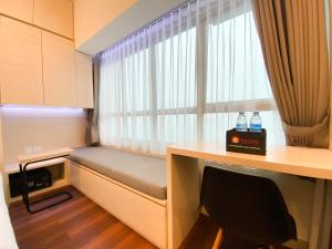 Pleasant and Tidy Studio Apartment Springlake Summarecon Bekasi By Travelio