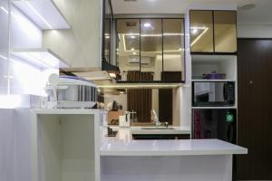 Comfort 2BR Apartment at 30th Floor Transpark Cibubur By Travelio
