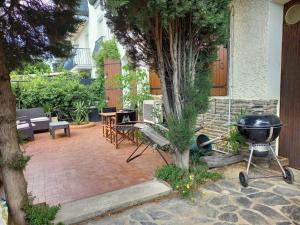 T2 climatisé avec jardin privatif et stationnement