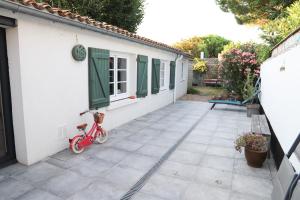 Maisons de vacances Maison familiale 4 chambres, au coeur de Loix, location a la semaine UNIQUEMENT : photos des chambres