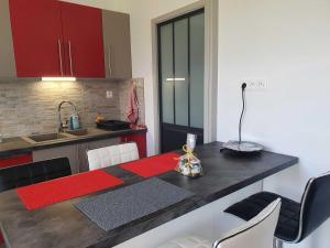 Maisons de vacances Le magnolia : photos des chambres