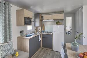 Campings Mobil home 3 chambres climatise : photos des chambres
