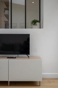 Appartements Appartement une chambre avec jardin, proche tram : photos des chambres