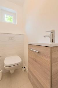 Appartements Appartement une chambre avec jardin, proche tram : photos des chambres