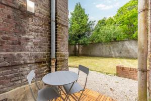 Appartements Appartement une chambre avec jardin, proche tram : photos des chambres