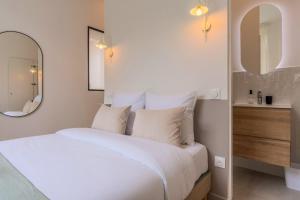 Appartements Appartement une chambre avec jardin, proche tram : photos des chambres