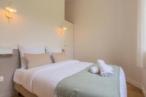 Appartements Appartement une chambre avec jardin, proche tram : photos des chambres