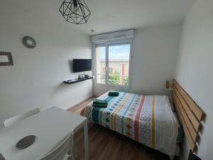 Appartements Studio 306 - Gare - Arena - centre Reims : photos des chambres