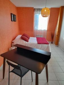 Appartements Le Maraicher avec terrasse, wifi, parking gratuit : photos des chambres
