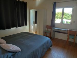Maisons de vacances Chez Gwen et Lulu - Maison en Bois - Trebeurden : photos des chambres