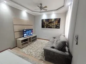 Casa com garagem, ar condicionado, sala tv e jantar, cozinha completa e lavanderia - 特雷门贝