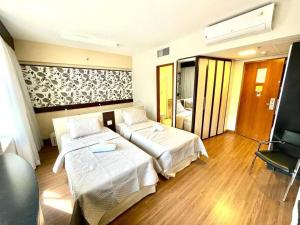 Flat com garagem perto hospital BP