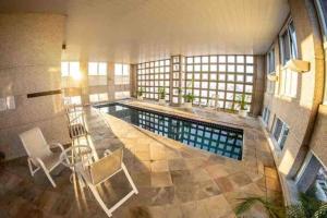 Flat com garagem perto hospital BP