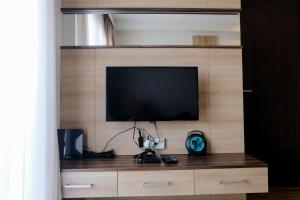 Homey and Cozy 2BR at Mekarwangi Square Cibaduyut Apartment By Travelio