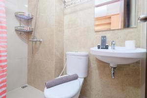 Nice and Fancy Studio at Transpark Cibubur Apartment By Travelio