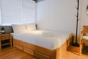 Studio with Private Living Room at Jarrdin Cihampelas Apartment By Travelio