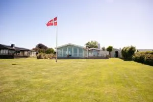 Strandhuset. - Vedelshave