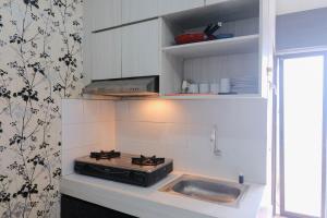 Good Choice 2BR Apartment at Gateway Ahmad Yani Cicadas By Travelio