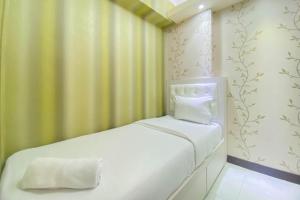 Fancy and Nice 2BR at Cinere Resort Apartment By Travelio