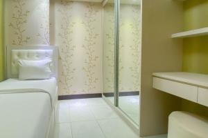 Fancy and Nice 2BR at Cinere Resort Apartment By Travelio