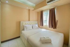 Fancy and Nice 2BR at Cinere Resort Apartment By Travelio