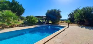 Maisons de vacances Le jardin du Grand Chemin : photos des chambres