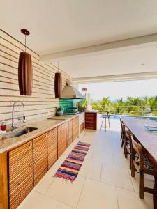 Casa pé na areia praia de Guaecá