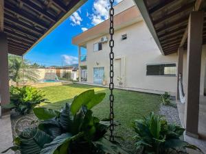 Casa com Piscina, Churrasqueira e Bilhar