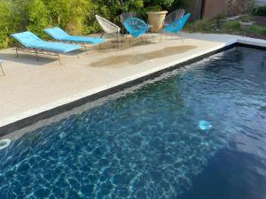 Villas Grand loft proche du centre avec jardin et piscine : photos des chambres
