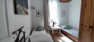 Sejours chez l'habitant PARIS AUTHENTIC HOUSE Metro 14 Station Hopital Bicetre, RER B Gentilly : photos des chambres