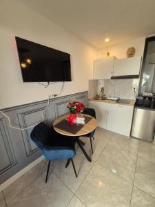 Appartements Le nid douillet calme proche du centre parking video projecteur : photos des chambres