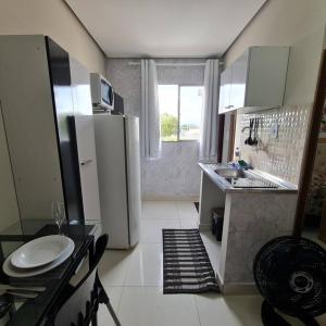 Kitnet203 centro, com linda vista janela, tv smart