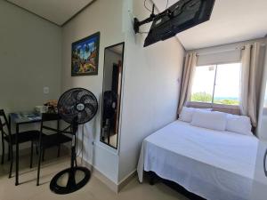 Kitnet 306 centro, com linda vista janela, tv smart