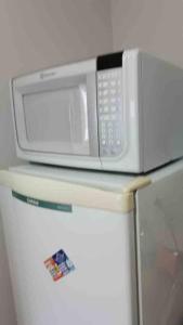 Kitnet 306 centro, com linda vista janela, tv smart