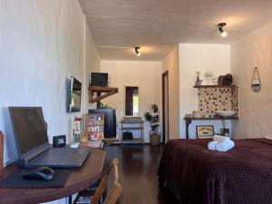 Espaço com Studios Rústicos na Lagoa da Conceição, Ar Condicionado e WiFi