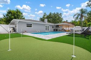 Serenity by the Sea! Cozy pool home with putting green & fire pit!