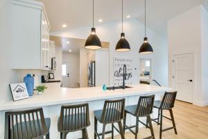 Pool Access & Lake Views: Modern Garden City Home