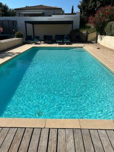 Appartements Studio neuf tout equipe 10 mn de Nimes et du CHU : photos des chambres
