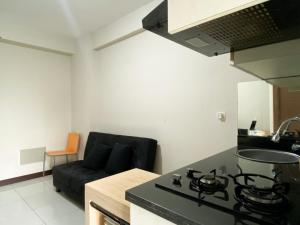 Basic 2BR at Lagoon Bekasi Town Square Apartment By Travelio