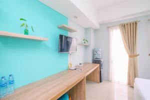 Homey and Simply Look Studio Room at Bogor Icon Apartment By Travelio
