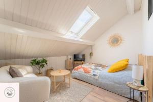 Appartements Dans les combles d-Eugene : photos des chambres