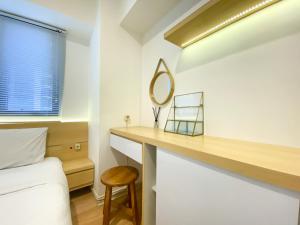 Nice and Comfy 2BR Apartment at Meikarta By Travelio