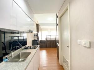 Luxury and Minimalist Studio at Patraland Urbano Apartment By Travelio