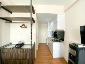 Luxury and Minimalist Studio at Patraland Urbano Apartment By Travelio