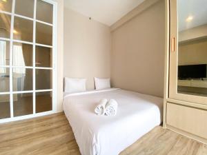 Cozy and Simple Big Studio Vasanta Innopark Apartment By Travelio