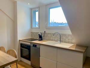 La Belle Odet- - choix d-appartements- Centre ville-quais : photos des chambres