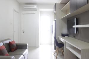 Homey 2BR Apartment at Parahyangan Residence near Parahyangan University By Travelio