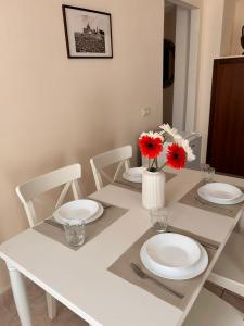 DOMUS Laura VATICANO