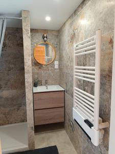 Appartements Escapade sous les pins 20m2 : photos des chambres