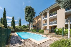 Appartements Le Cocon d-Adamille - Appt avec piscine partagee : photos des chambres